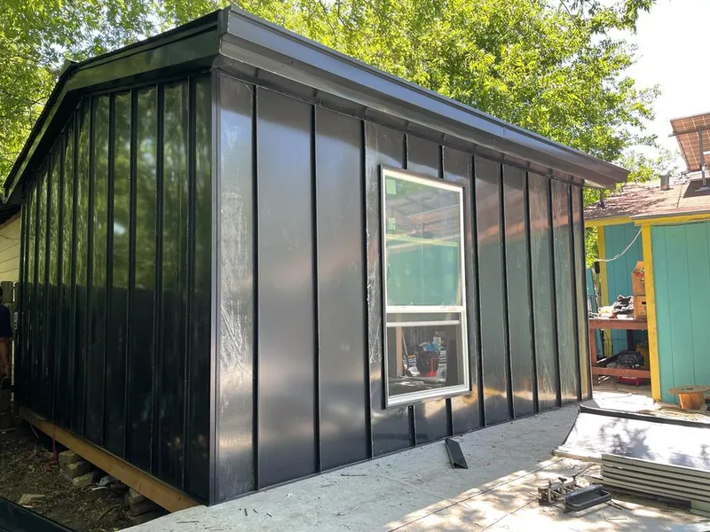 Black standing seam metal wall panels for Metal Roof Installation in Terrell