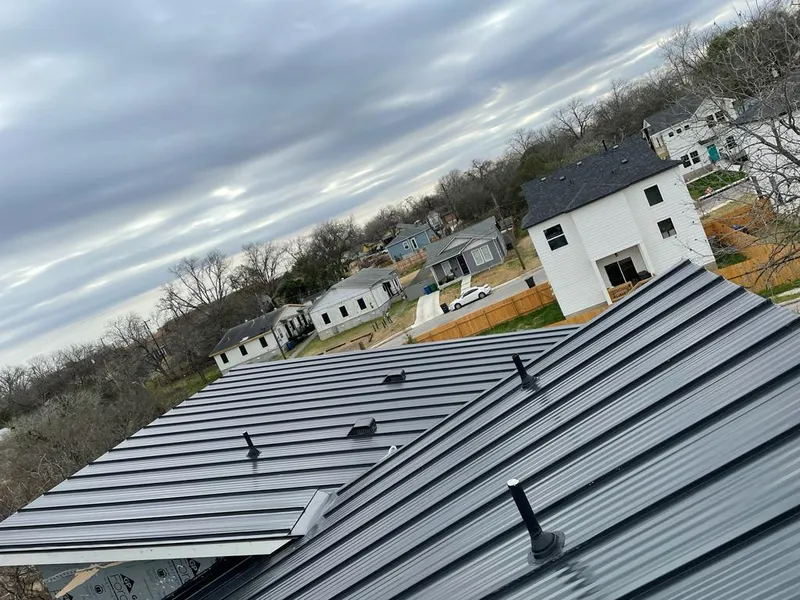 Standing seam metal roof panels with vents for Skylight Repair in Terrell